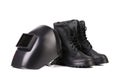 Welding mask and working boots. Royalty Free Stock Photo