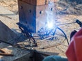 Welding metal and wood by electrode with bright electric arc