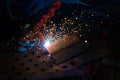 Welding with mig-mag method. Small depth of field Royalty Free Stock Photo