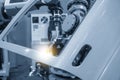 The welding robot working with automotive parts assembly processing.