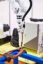 Welding robotic arm industry and metal part Royalty Free Stock Photo