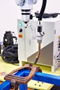 Welding robotic arm industry and metal part Royalty Free Stock Photo