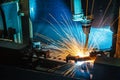 Welding robots movement in a car factory Royalty Free Stock Photo