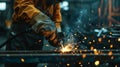 Welding sparks, Industrial worker using torch to welding metal in factory Royalty Free Stock Photo