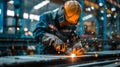 Welding sparks, Industrial worker using torch to welding metal in factory Royalty Free Stock Photo