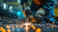 Welding sparks, Industrial worker using torch to welding metal in factory Royalty Free Stock Photo