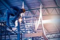 Welding of steel structures, Worker welding steel with sparks at outdoors construction site, background for industrial and constru