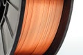 Welding wire spool on a white background Royalty Free Stock Photo