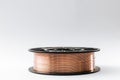 Welding wire on a spool on a white background, copy space Royalty Free Stock Photo