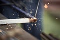 Welding work. Sparks fly in different directions. Royalty Free Stock Photo
