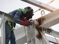 Welding work, worker with protective welding