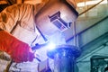 Workers welder is welding in factory Royalty Free Stock Photo