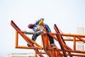 The welding workers at structures site. Worker is welding steel structures Royalty Free Stock Photo
