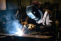 Welding workshop with skilled workers using various techniques, such as MIG, TIG, and arc welding, to join metal pieces together Royalty Free Stock Photo