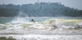 Jet ski rider in Weligama beach, the scenic landscape in the background