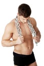 Well build male model with chains over his neck.