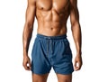 Generative AI. Muscular Man Standing Proudly in Blue Athletic Shorts Showcasing Fitness Results. Summer Holidays Concept Royalty Free Stock Photo