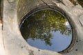 A well carved into the rock by a mountain river, rocks in the carpathians, background, nature Royalty Free Stock Photo