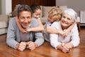 Well cherish these moments forever. Group shot of a brother and sister bonding with their grandparents. Royalty Free Stock Photo
