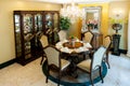 Well decorated formal dining room in home Royalty Free Stock Photo