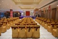 A well decorated royal wedding lounge with covered seating and dining hall. Royalty Free Stock Photo