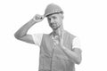 Well done. excited electrician show ok gesture. handsome service worker isolated on white. asphalt worker at