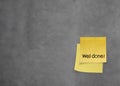 Well done words on crumpled sticky note paper on texture wall Royalty Free Stock Photo