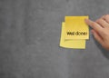 Well done words on crumpled sticky note paper on texture wall a