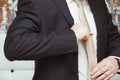 Well dressed man adjusting his neck tie Royalty Free Stock Photo