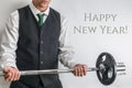 Well dressed man performing biceps curl. Concept for new years resolution and workout