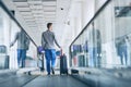 Well dressed man travel by airplane Royalty Free Stock Photo