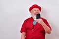 Happy old man is having a fun conversation over his phone Royalty Free Stock Photo
