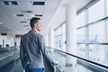 Well dressed young man travel by airplane Royalty Free Stock Photo