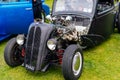 Well groomed black Hot Rod Ford from 1932 with open hood