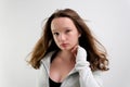 well-groomed brown hair beautiful young girl adolescence waving her head slow motion video on a white background studio Royalty Free Stock Photo