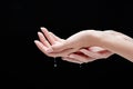 Close up female hands and water drops. Royalty Free Stock Photo