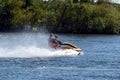 Well, Holland - 06/30/2018: Boating with speed on a jetski