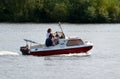 Well, Holland - 07/07/2018: German average tourist couple slowly boating