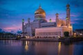 Omar Ali Saifuddien Mosque in Bandar Seri Begawan, Brunei Darussalam at pink sunset with deep blue sky background Royalty Free Stock Photo