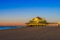 The well known pier jetty of Blankenberge beach, Beglium, Beautiful coast with blue water and a colorful sky during sunset