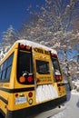 The well-known yellow school bus covered in snow in Vancouver