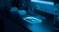 Nighttime Laboratory Research: Microscopic Analysis Under Blue Light in a Modern Scientific Setting Royalty Free Stock Photo