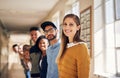 Well make the future brighter together. Portrait of a diverse group of students standing in a line at campus. Royalty Free Stock Photo