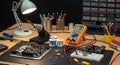 Electronics Workbench with Circuit Boards and Testing Equipment Royalty Free Stock Photo