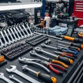 A well-organized mechanic\'s workshop with an array of tools on a workbench Royalty Free Stock Photo