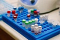 Well plate with test tubes with samples for analysis Royalty Free Stock Photo