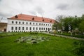 Well-preserved old building with garden and green alley at the Dubno