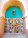 Well preserved old Moroccan door with a colorful traditional lantern, Taroudant, Morocco