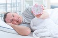 Well-rested man in bed Royalty Free Stock Photo