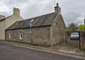 A well restored stone built, traditional Scottish terraced Cottage in Long Lane in Broughty Ferry.